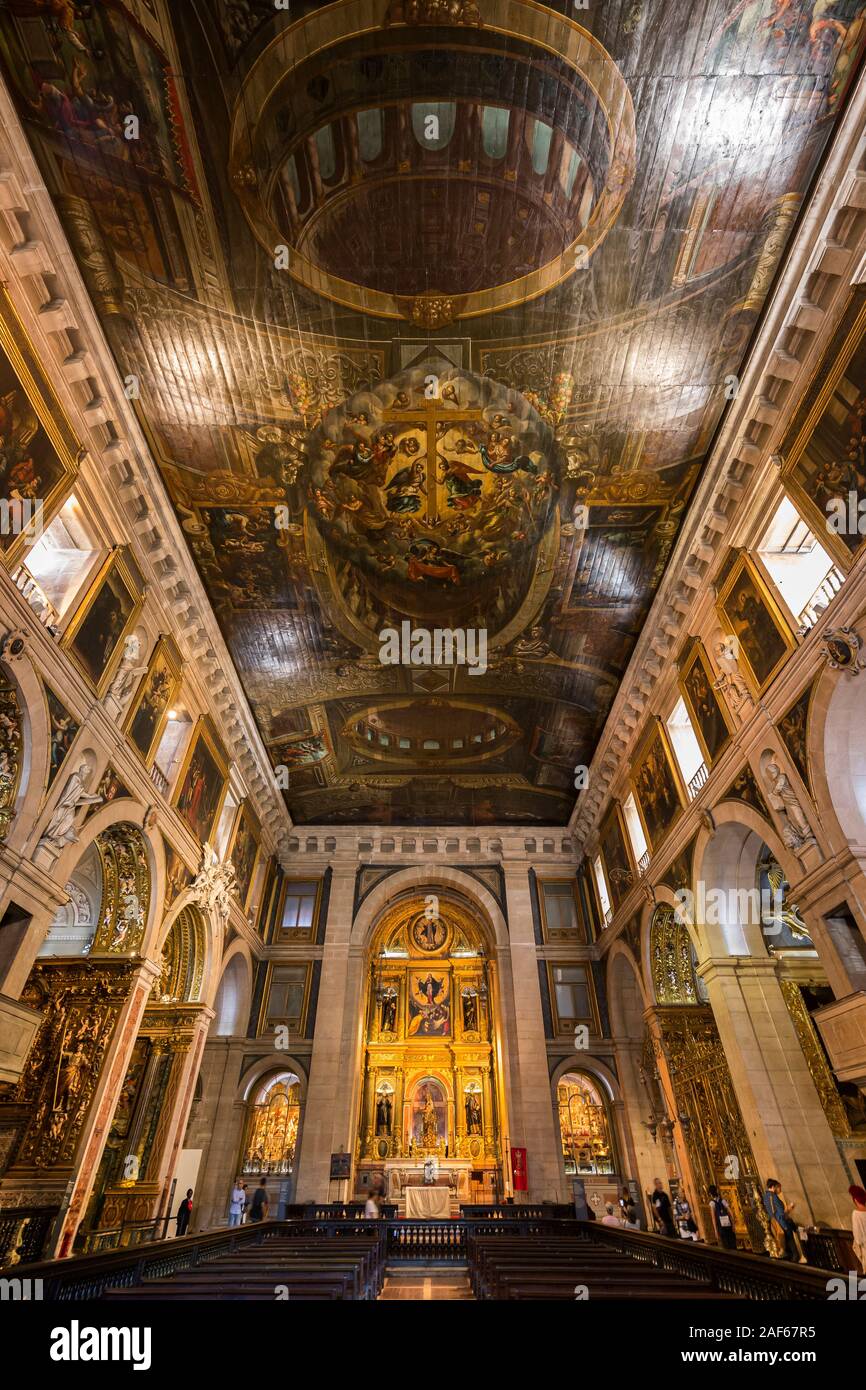 Ornate interior of the Roman Catholic church Igreja de Sao Roque (Church of Saint Roch) looking towards the main altar. Lisbon, Portugal. Stock Photo