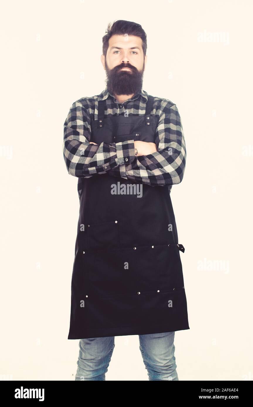 Deep thinker. Self employed worker keeping his arms crossed. Confident