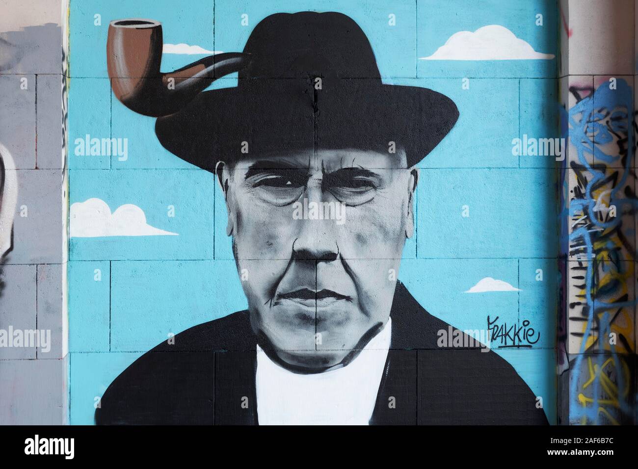 Portrait of the painter Rene Magritte, with pipe, graffito, street art, Brussels, Belgium Stock Photo