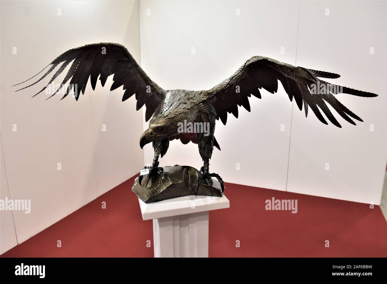 HANDICRAFT AND GASTRONOMY MARKET EXHIBITION.A WROUGHT IRON EAGLE Stock Photo