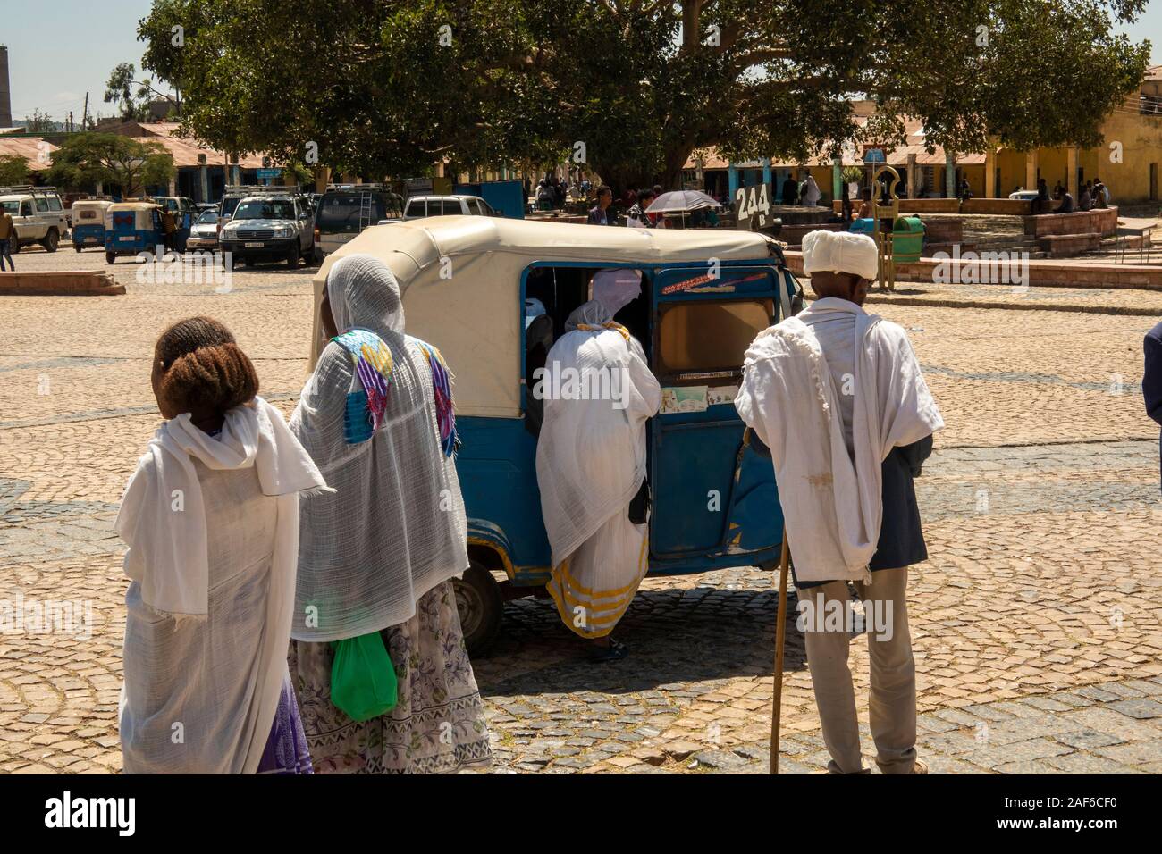 Ethiopia, Tigray, Axum (Aksum), city centre, transport, family boarding Bajaj tuk tuk Stock Photo