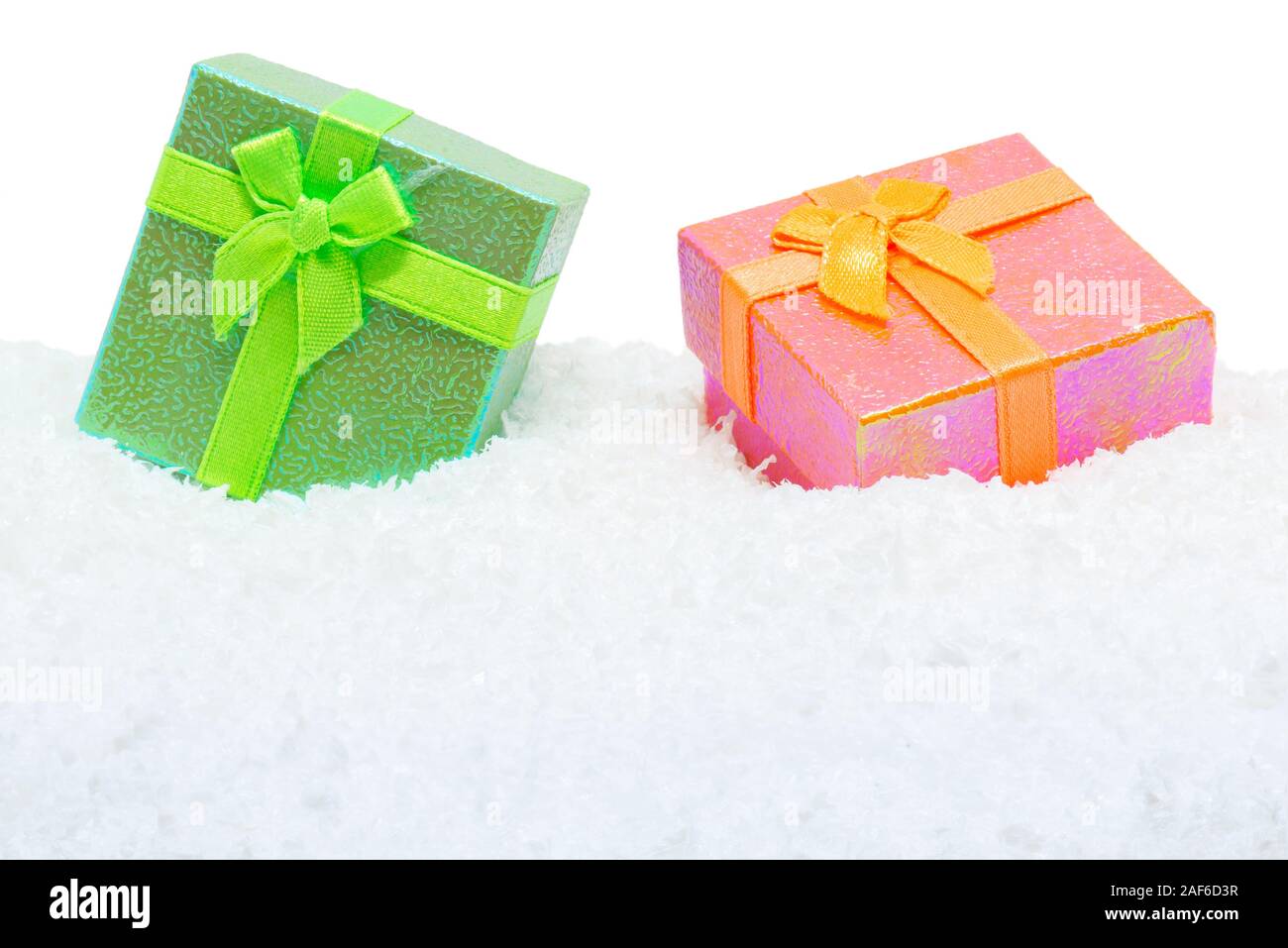 Two square gift boxes in snow white background Stock Photo