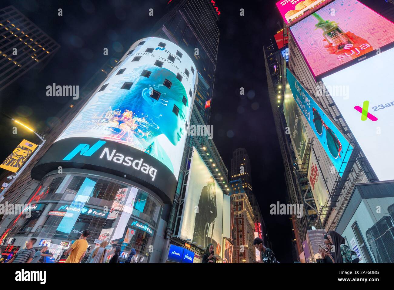 NASDAQ building in Time Square at night Stock Photo