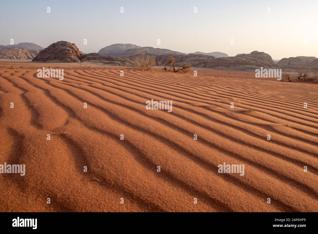 Desert scenery. Red sand plateau at the foot of the Edom mountains, Jordan Stock Photo