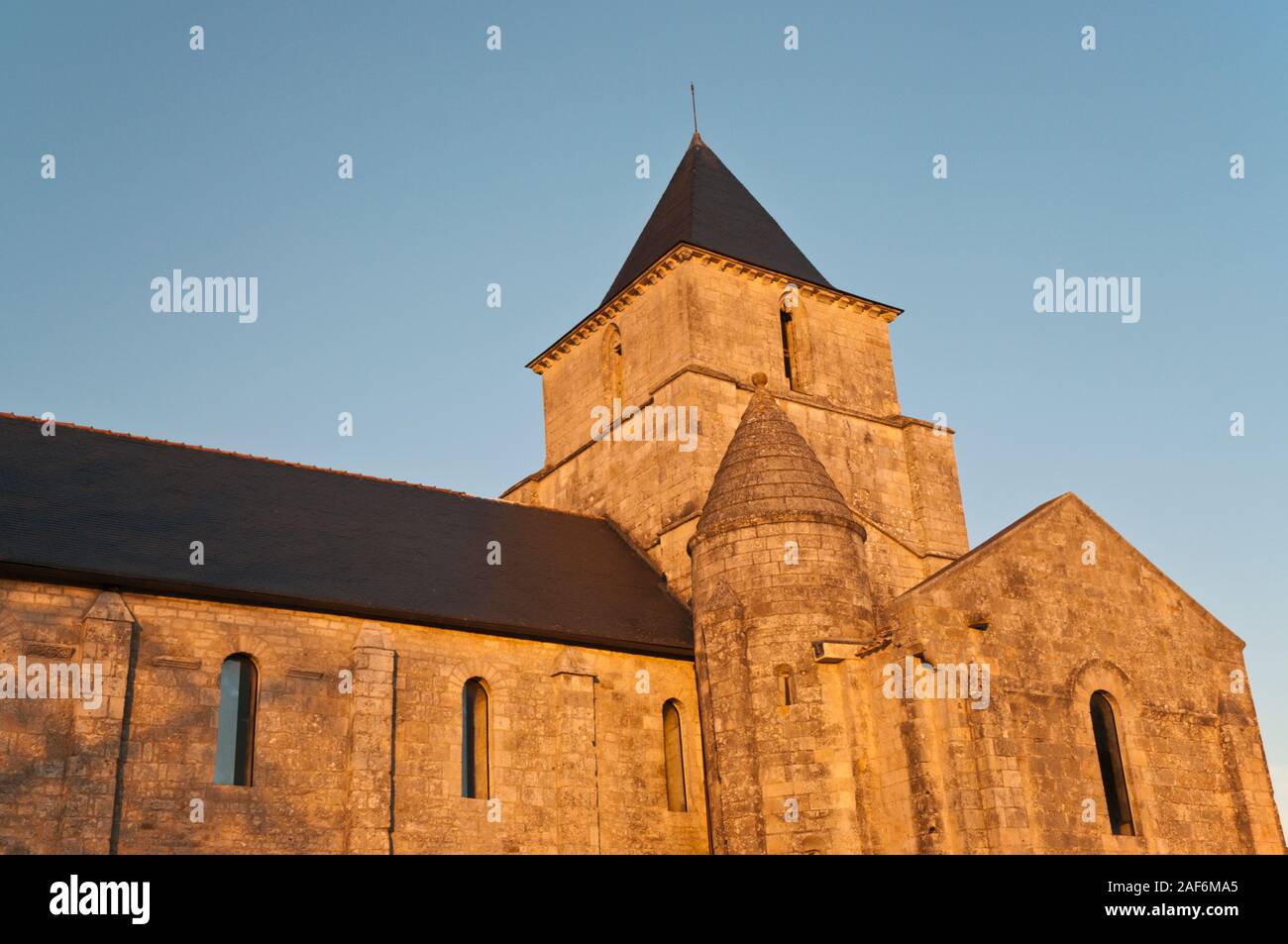 Saint-Savinien roman church at sunset, Melle, Deux-Sevres (79), Nouvelle-Aquitaine region, France. It is a listed historic monument. Stock Photo