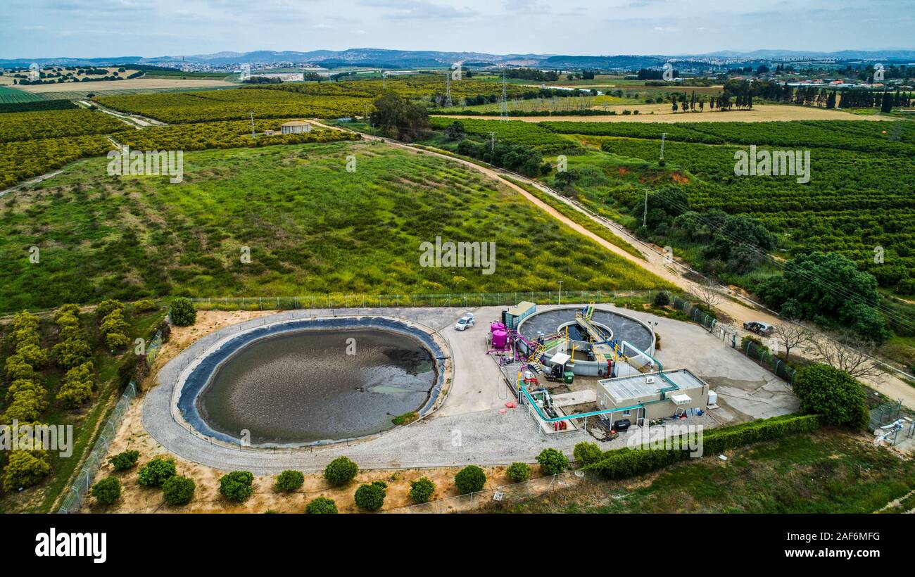 Aerial photography of a sewerage treatment facility. The treated water is then used for irrigation and agricultural use. Photographed, Israel Stock Photo