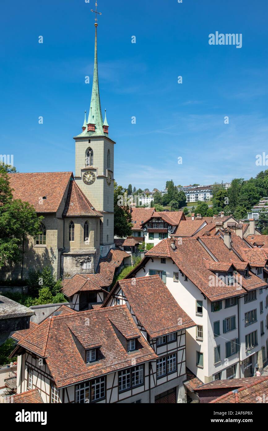Nydegg Church (Nydeggkirche) and houses with tiled rooftops, Bern Switzerland Stock Photo
