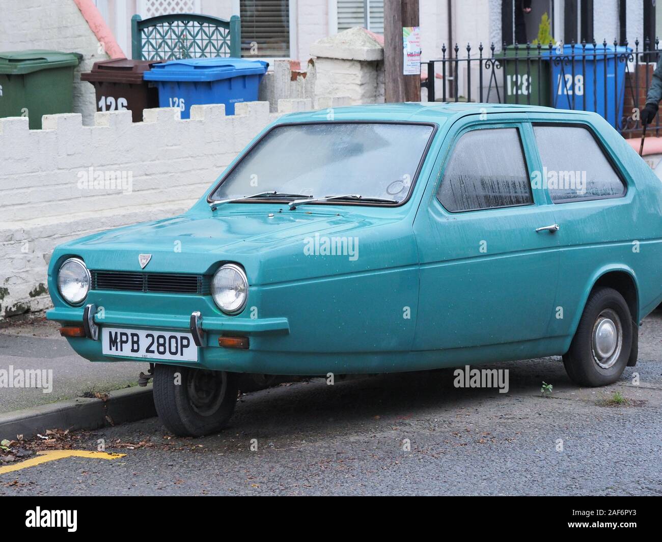 A front and side view of a Reliant Robin small three-wheeled car. Stock Photo