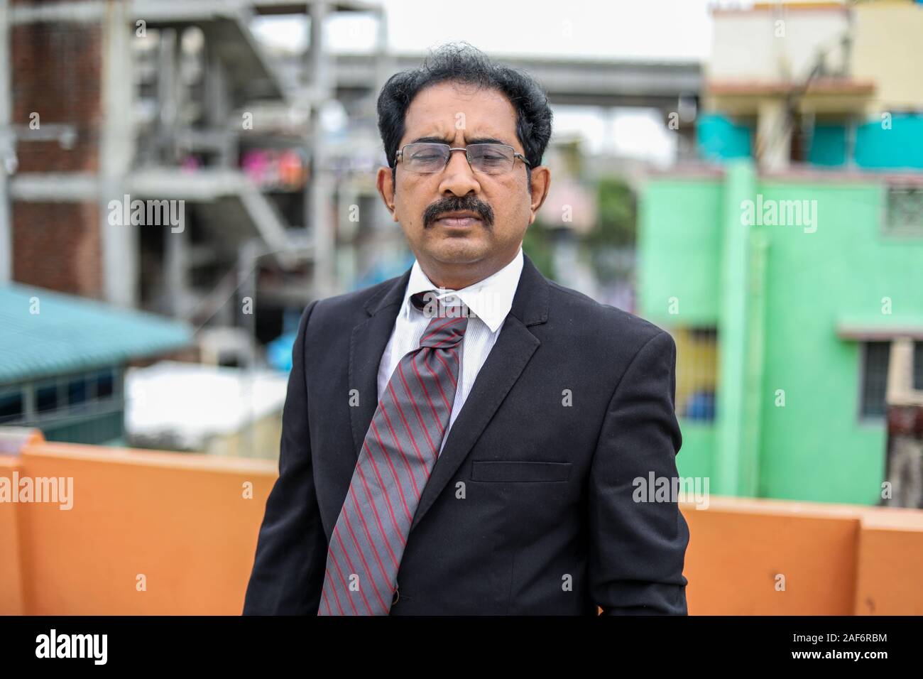 Confident businessman posing in the outdoors Stock Photo - Alamy