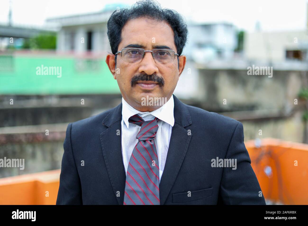 Confident businessman posing in the outdoors Stock Photo - Alamy