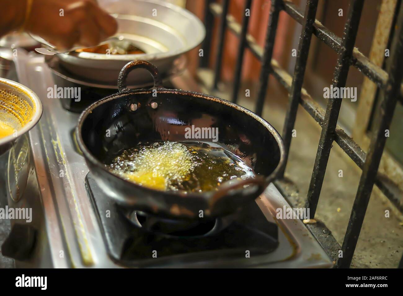 Onion bajji, deep fried onion bhajis in home kitchen Stock Photo Alamy