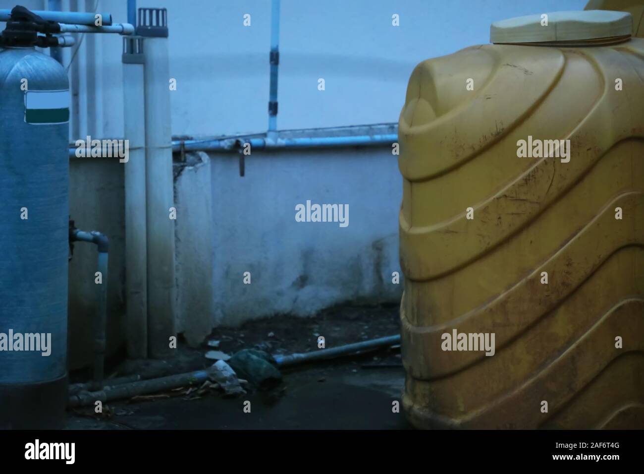 Water tanks on the roof of a house Stock Photo Alamy