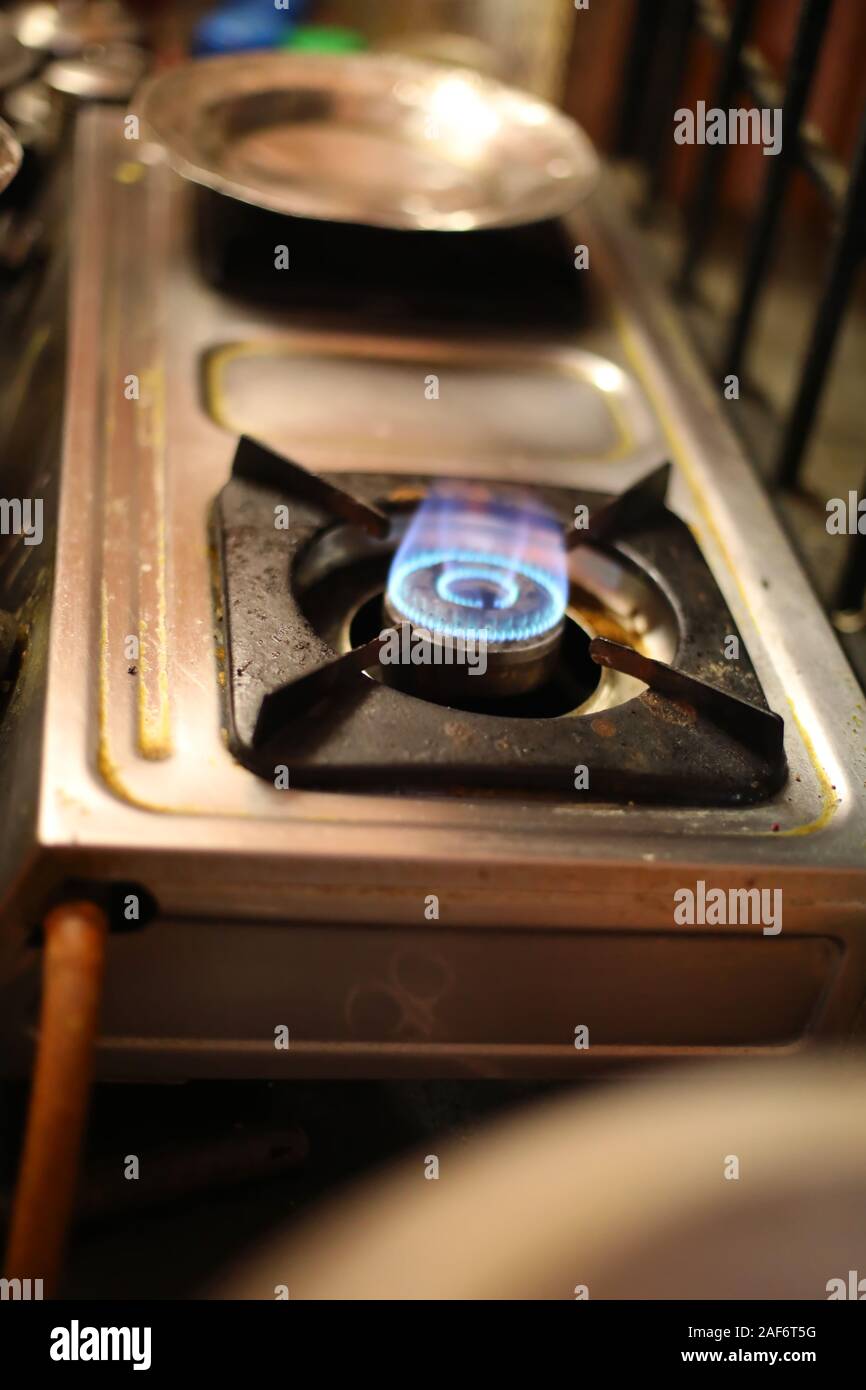 Closeup of the fire burner on the gas kitchen stove Stock Photo Alamy