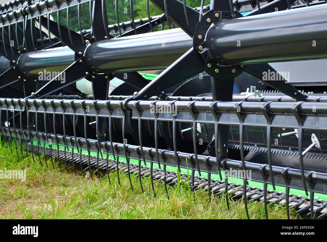 Combine harvester's teeth closeup, horizontal shot Stock Photo Alamy