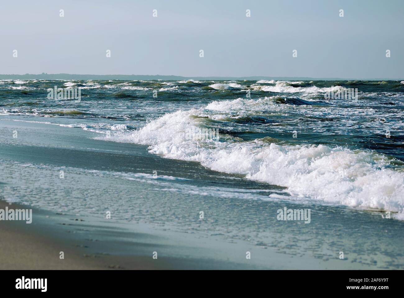 Blue waves on the coast of the Baltic Sea. Yantarny township, Kaliningrad region, Russia Stock Photo