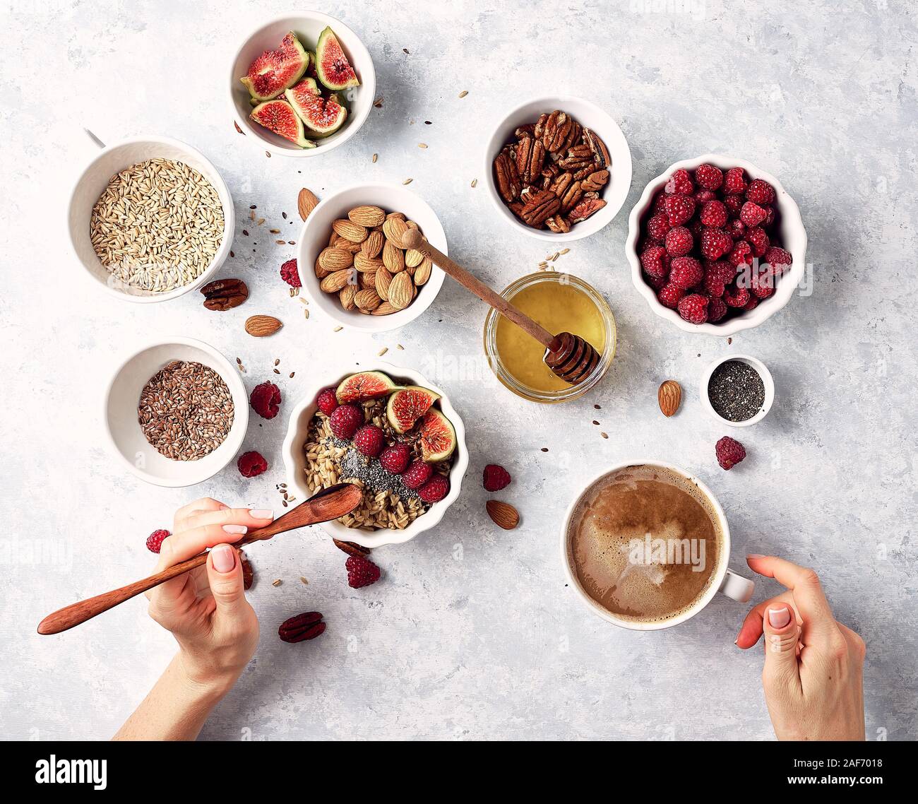 Healthy breakfast, top view. Oatmeal porridge with raspberries, figs