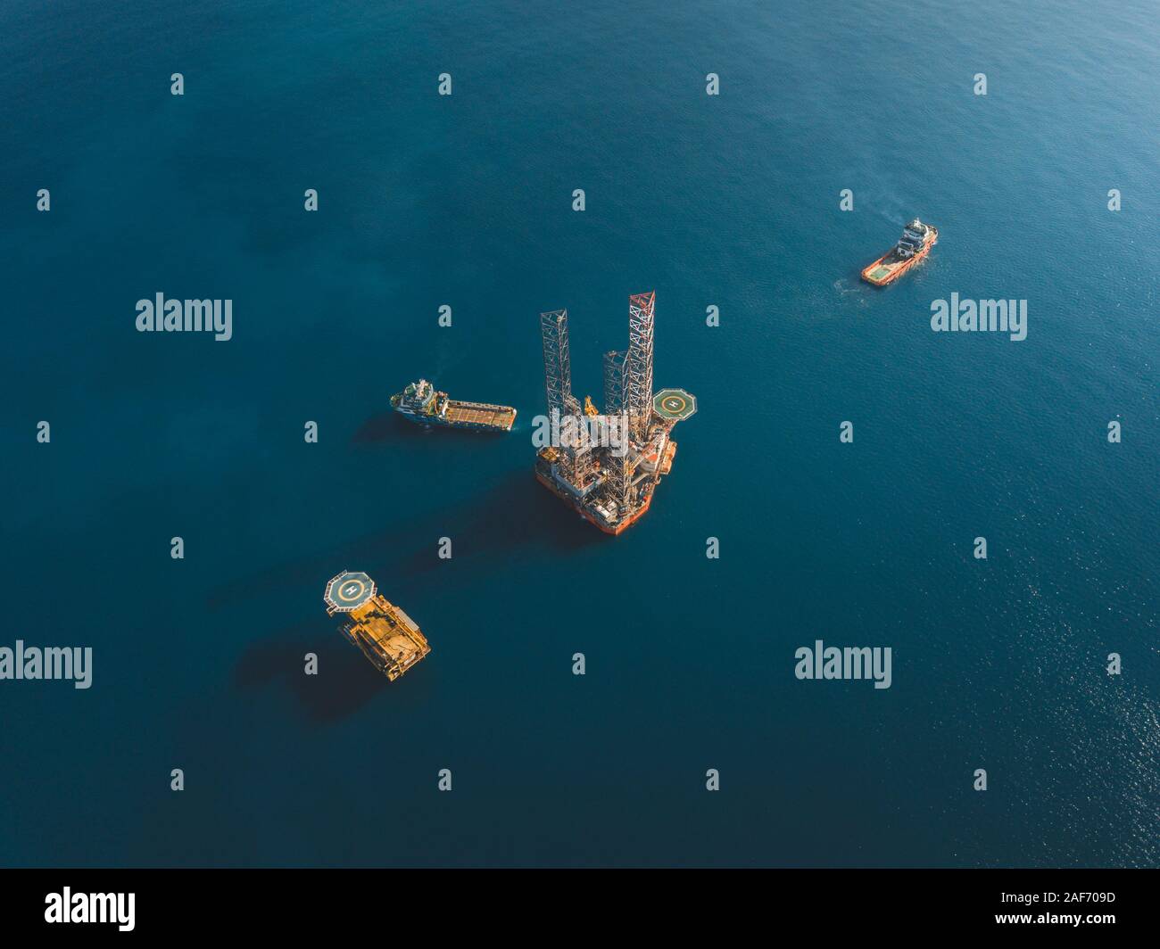 Aerial image during rig move operation in offshore oil field Stock Photo