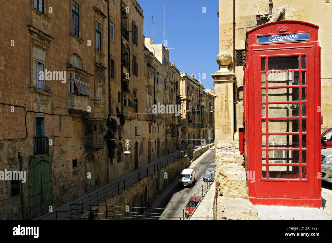 Red telephone box in Valletta, Malta Stock Photo