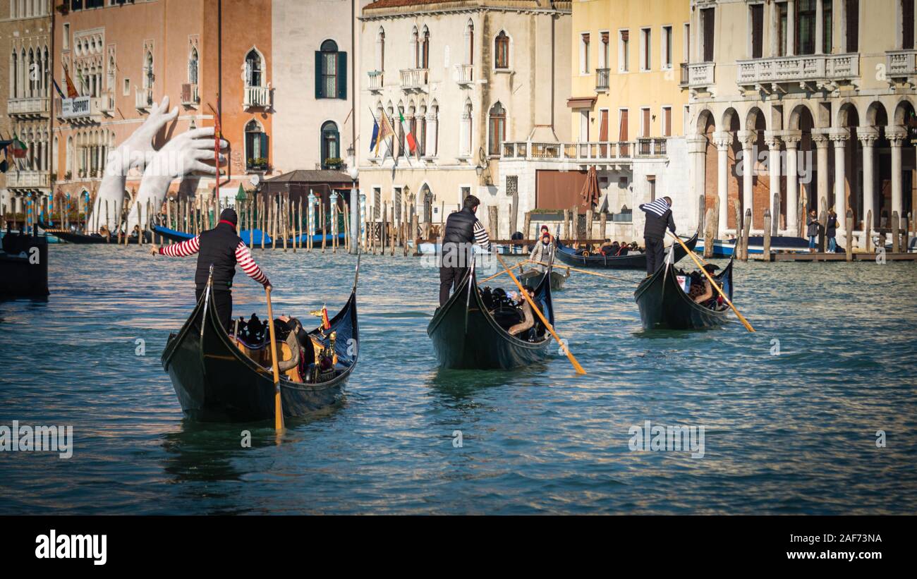 Three gondols on the Canale Grande in Venice Stock Photo
