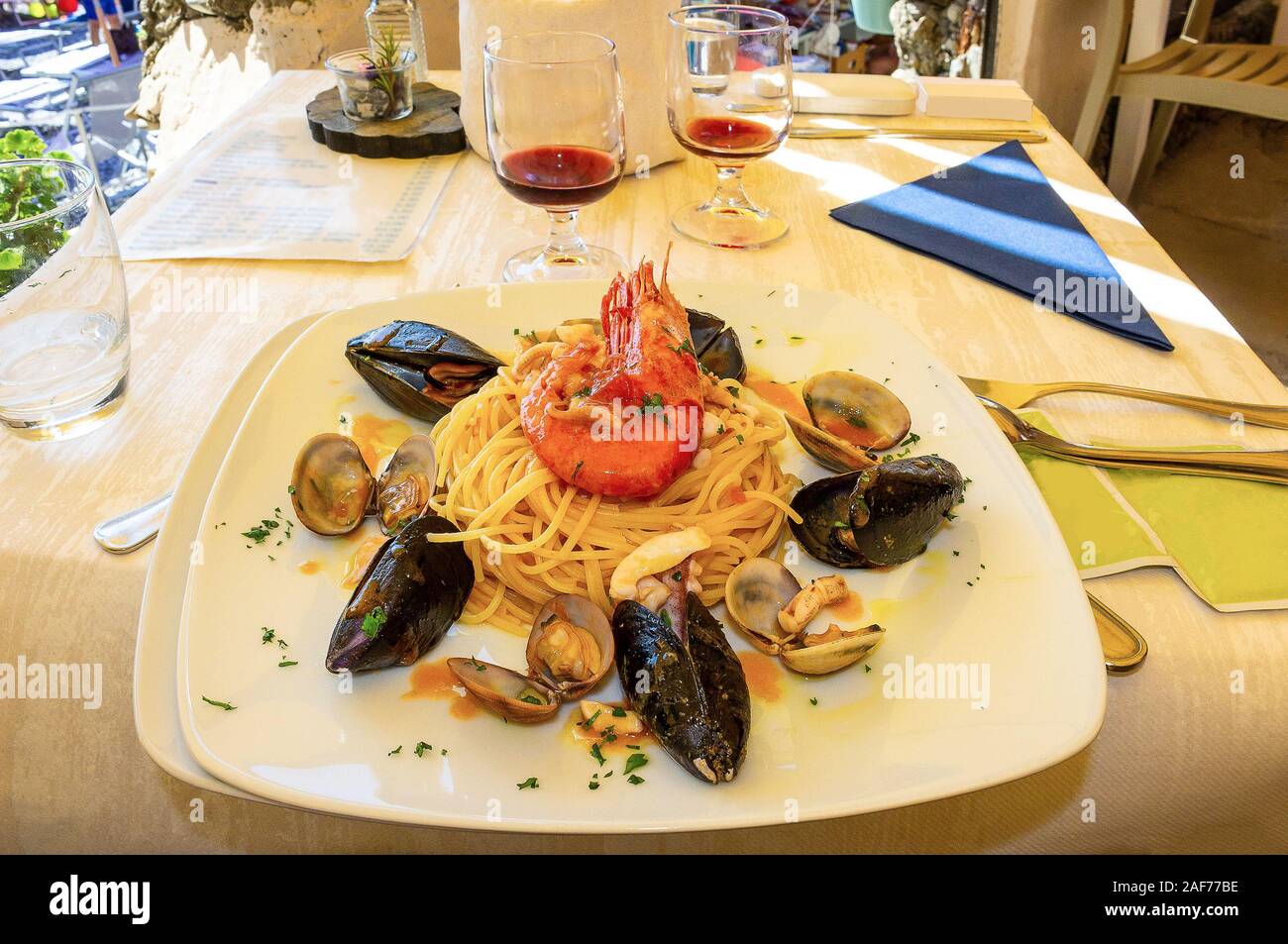 Pasta with seafood on plate at Italy Stock Photo