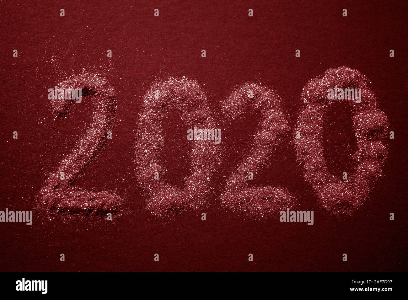 2020 text pattern on red table, top view. Stock Photo
