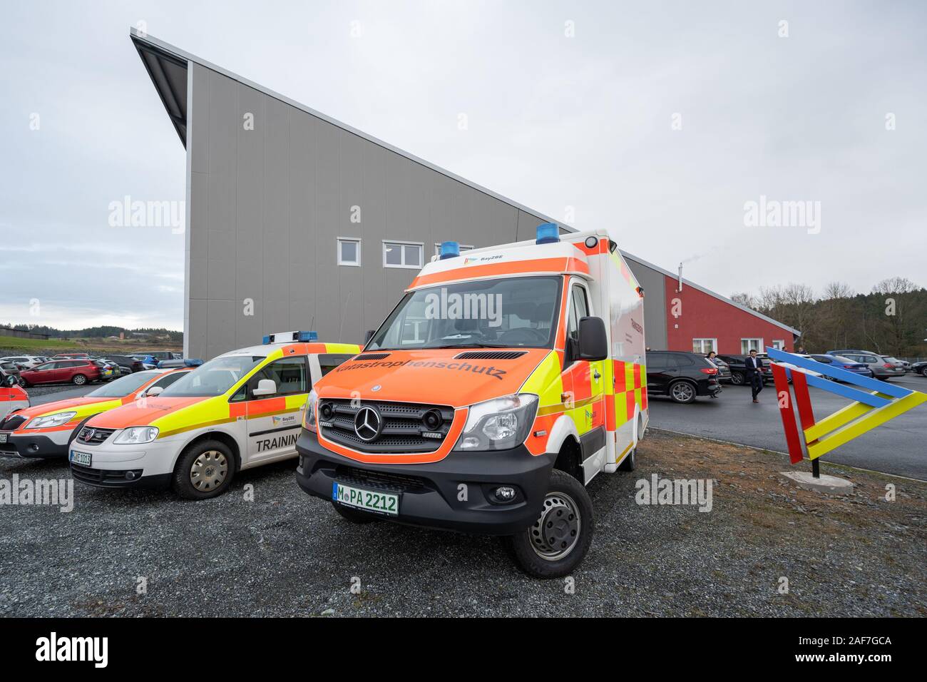 Windischeschenbach, Germany. 13th Dec, 2019. Rescue vehicles are parked in front of the Bavarian Centre for Special Operations. In the new training and simulation centre of the Bavarian aid organisations, mission leaders and executives will be practicing for example for amok and terror situations. Credit: Armin Weigel/dpa/Alamy Live News Stock Photo