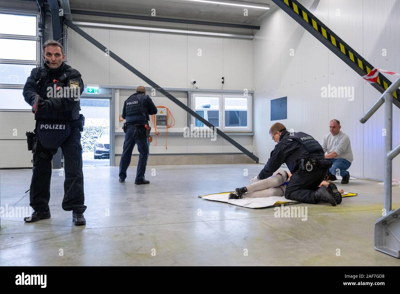 Windischeschenbach, Germany. 13th Dec, 2019. Emergency forces practice in the Bavarian Centre for Special Operations. In the new training and simulation centre of the Bavarian aid organisations, mission leaders and executives will be practicing for example for amok and terror situations. Credit: Armin Weigel/dpa/Alamy Live News Stock Photo