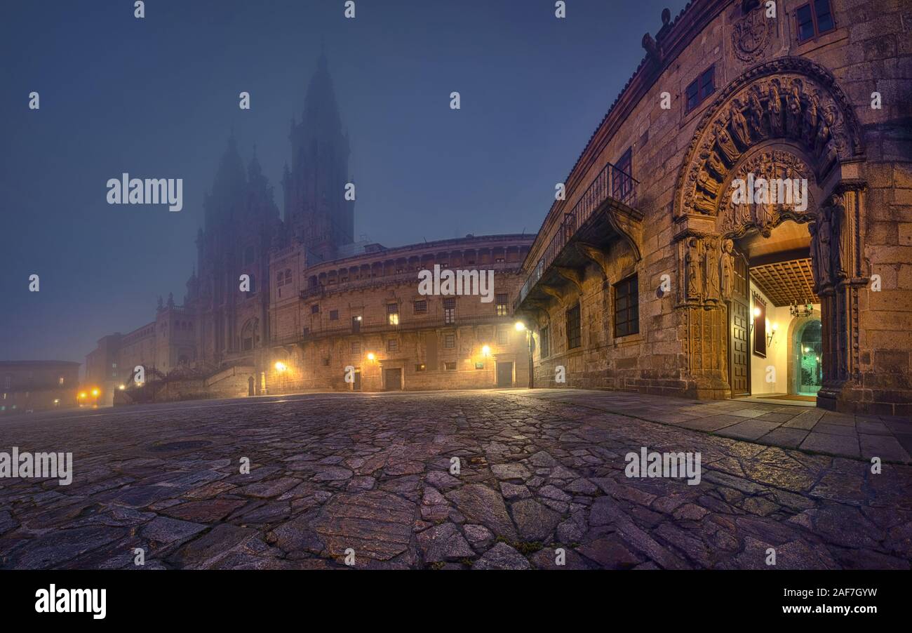 Santiago de Compostela, Spain. View of Praza do Obradoiro square in front of Cathedral with strong morning fog Stock Photo