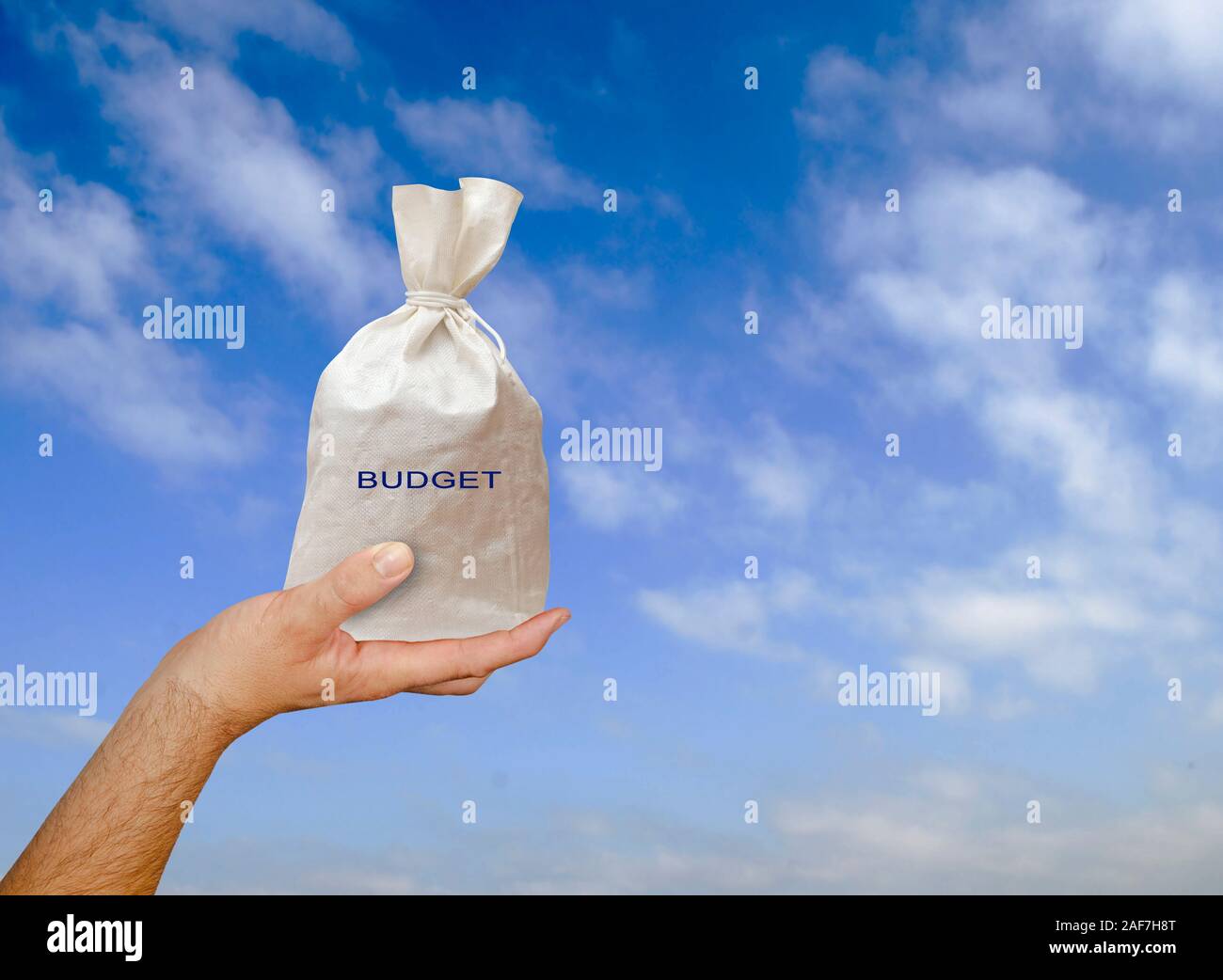 Hand with budget Stock Photo - Alamy
