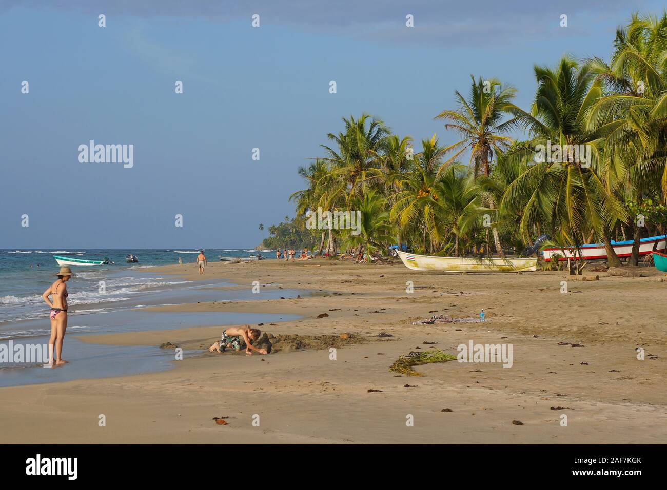 Costa Rica, tropical beach on the Caribbean coast with some tourists, Manzanillo, Limon province, Central America Stock Photo