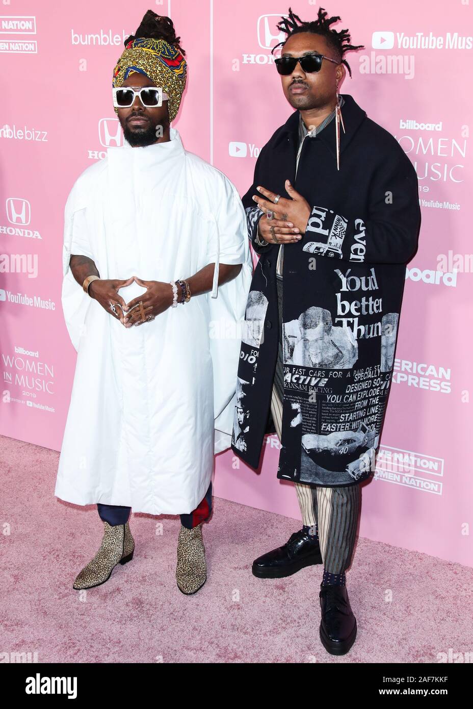 HOLLYWOOD, LOS ANGELES, CALIFORNIA, USA - DECEMBER 12: Johnny Venus and  Doctur Dot of EarthGang arrive at the 2019 Billboard Women In Music  Presented By YouTube Music held at the Hollywood Palladium