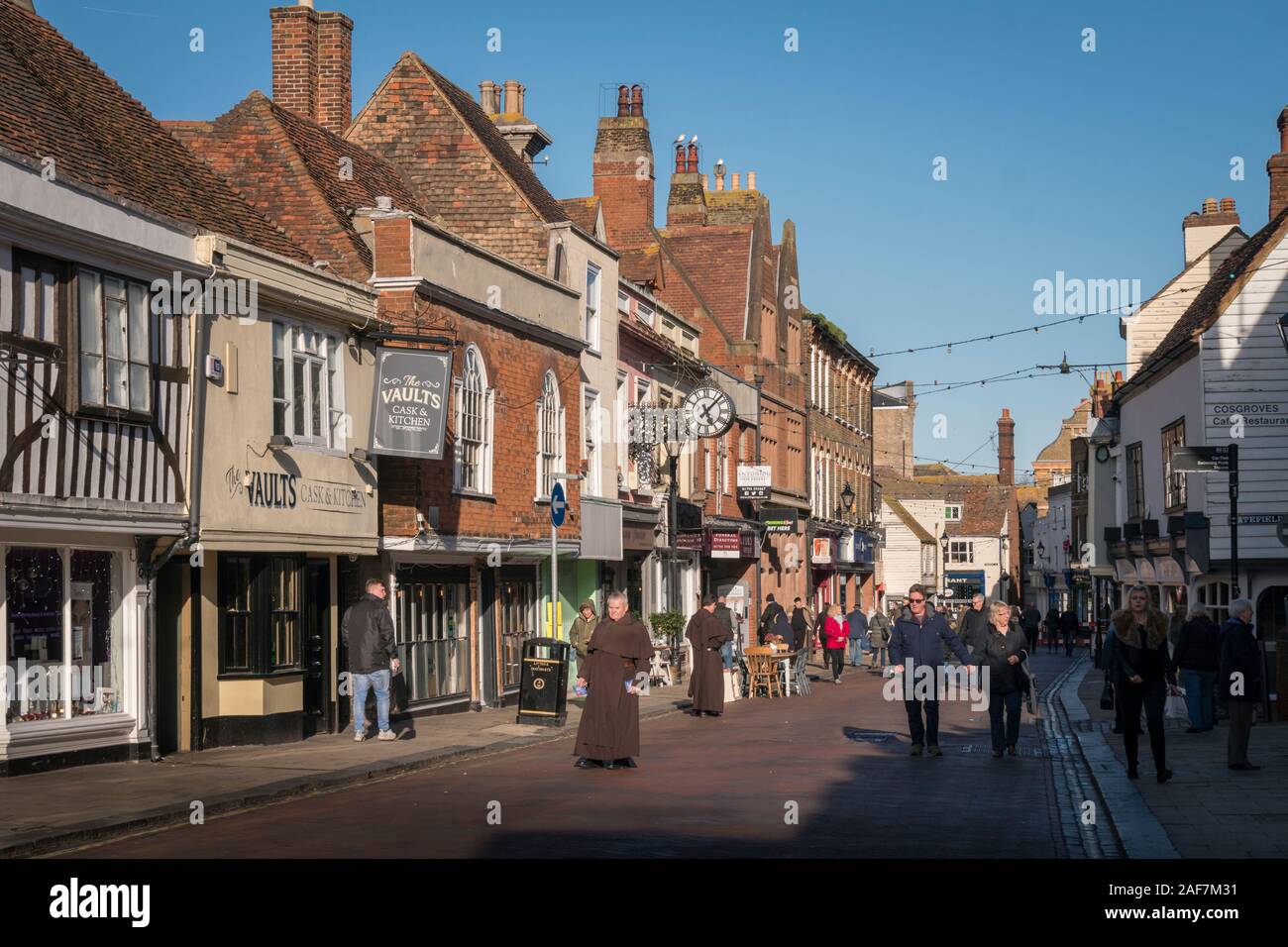 Tourists and shoppers in Preston Street, in the medieval market town of Faversham, Kent, UK