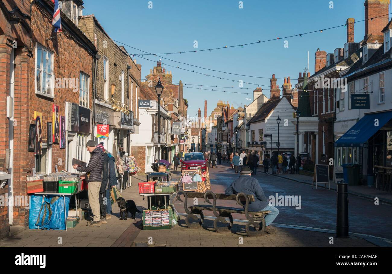 Tourists and shoppers in Preston Street, in the medieval market town of Faversham, Kent, UK