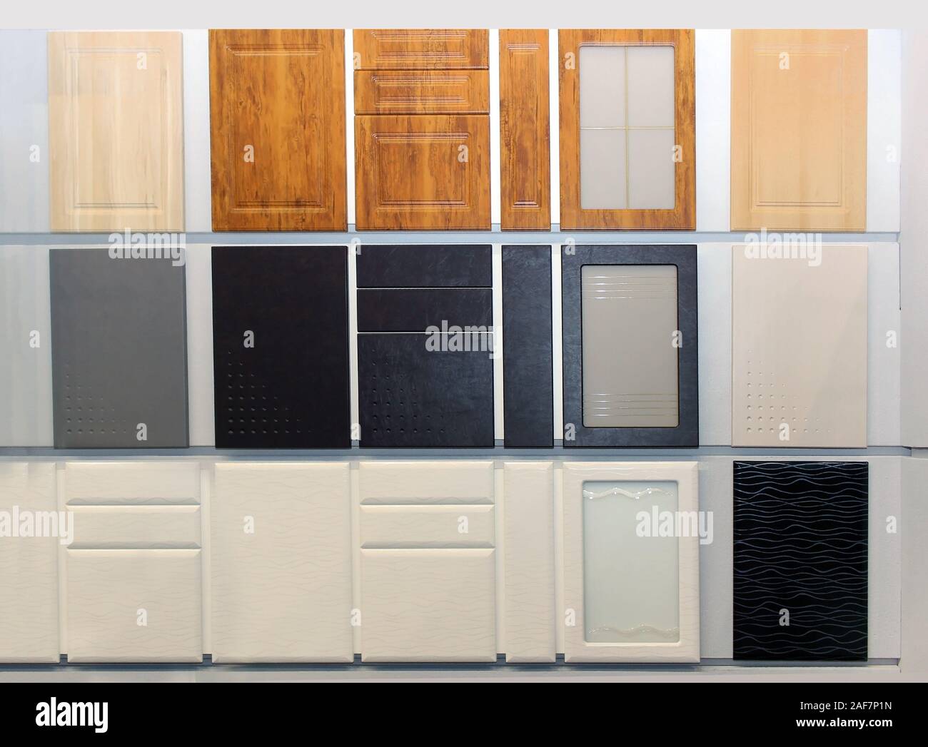 Wooden kitchen cabinets door samples in interior show room Stock Photo ...