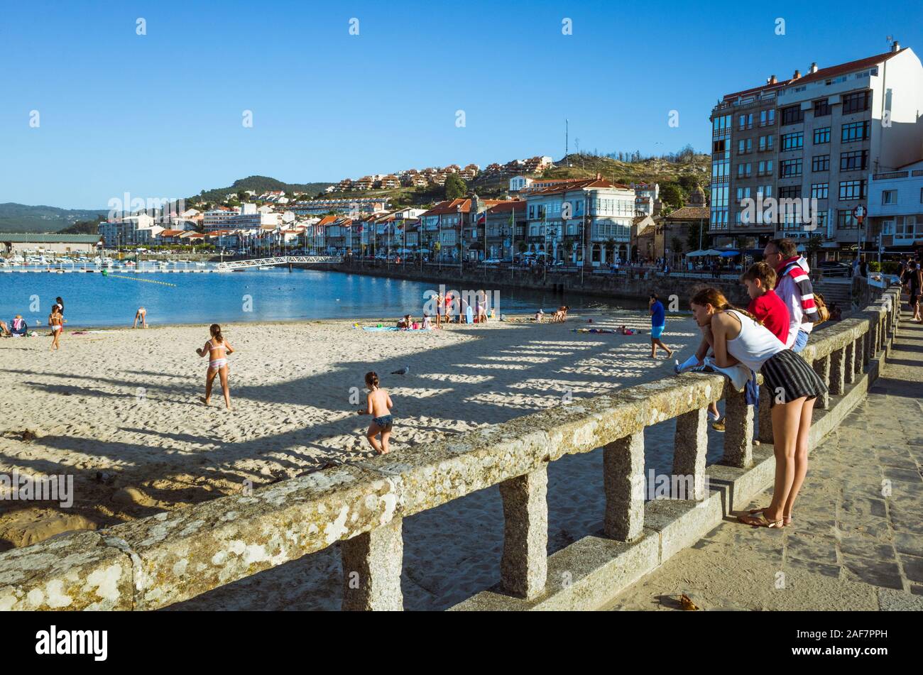 Baiona, Pontevedra province, Galicia, Spain : People relax at the Playa de la Ribera beach in the historical tourist town of Baiona. Stock Photo