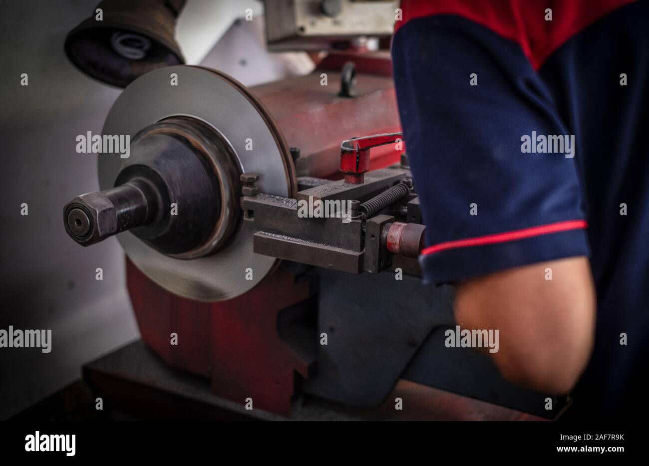 Brake lathe tool polishing disc brakes of cars working automatic Stock Photo Alamy