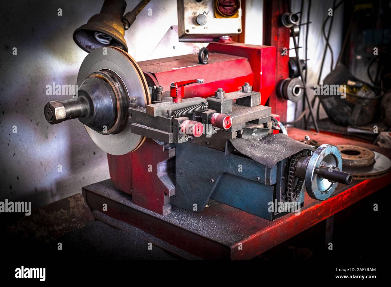 Brake lathe tool polishing disc brakes of cars working automatic Stock Photo Alamy