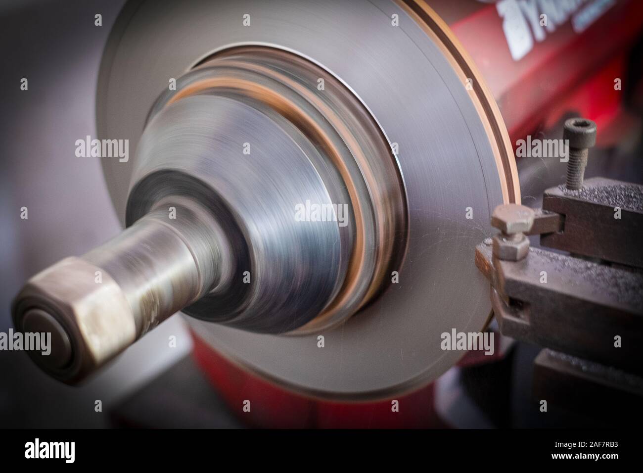Brake lathe tool polishing disc brakes of cars working automatic Stock Photo Alamy