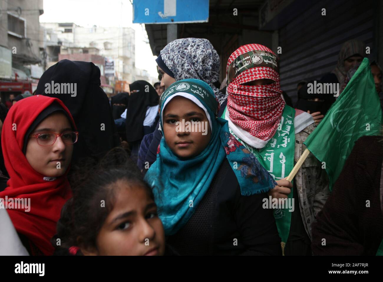 Khan Younis, Gaza. 13th Dec, 2019. Palestinian women attend a rally marking the 32nd anniversary of the founding of the Islamist movement Hamas in Khan Yunis in the southern Gaza Strip on Friday, on December 13, 2019. Photo by Ismael Mohamad/UPI Credit: UPI/Alamy Live News Stock Photo