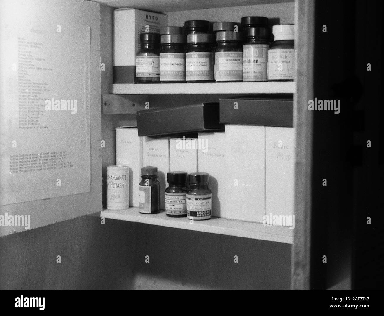 1950s, historical, wooden wall mounted showing bottles of