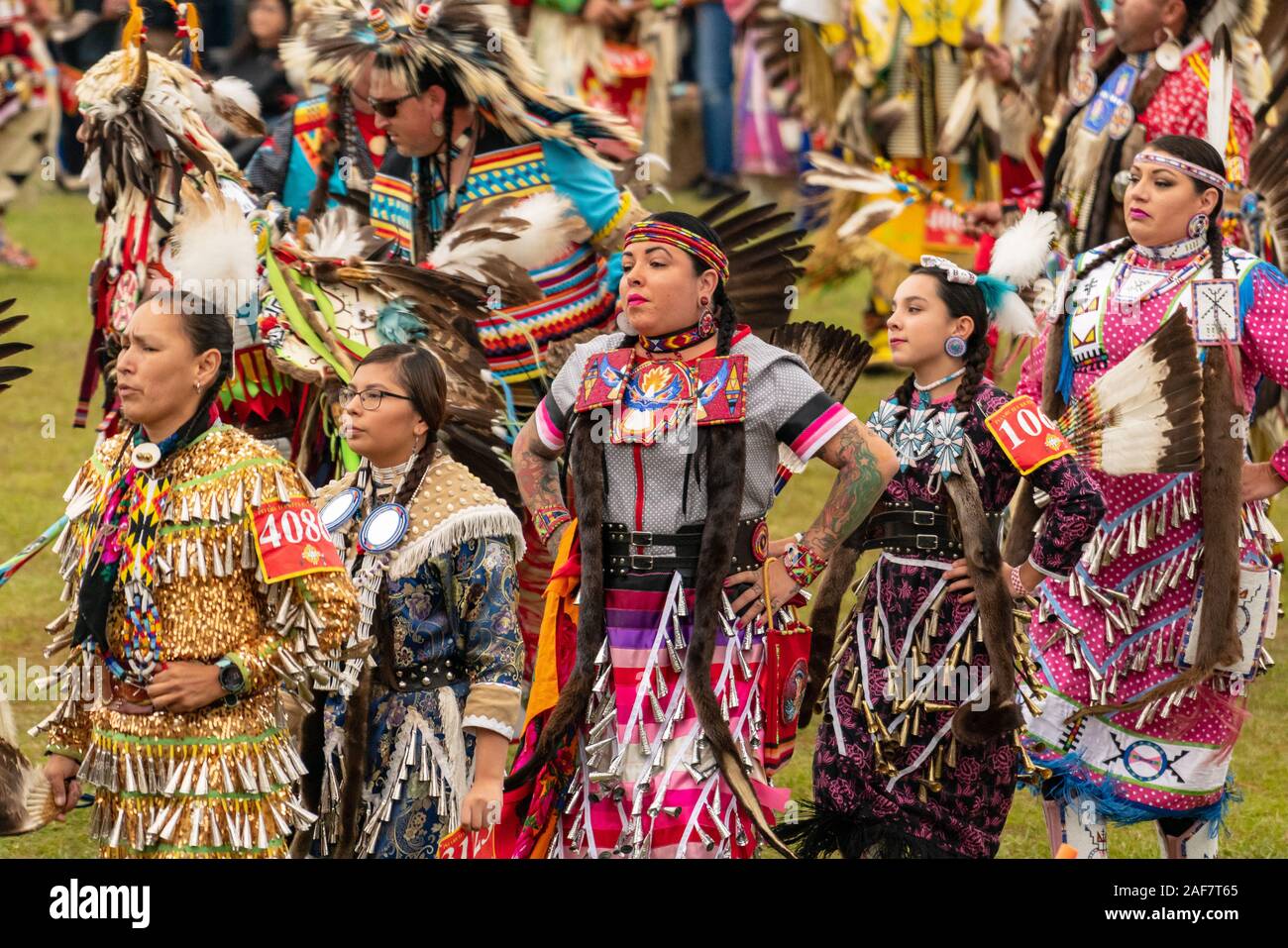 Women in traditional dress dance at the Poarch Creek Indian