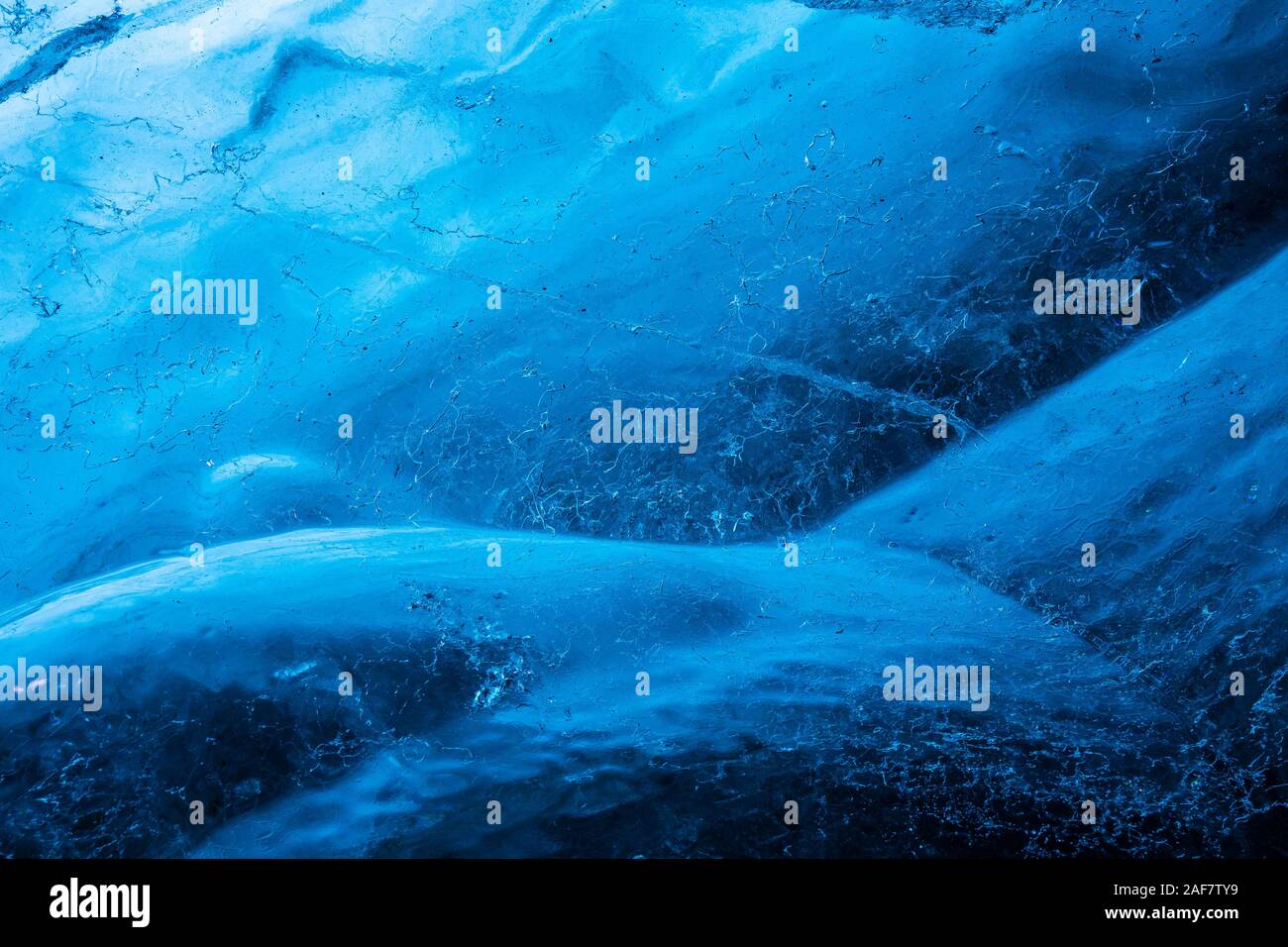 Under the Glacier: Close-up shot of the surface in an ice cave, Iceland Stock Photo