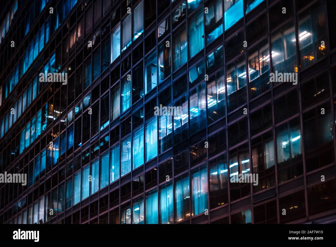office building facade at night - business district Stock Photo