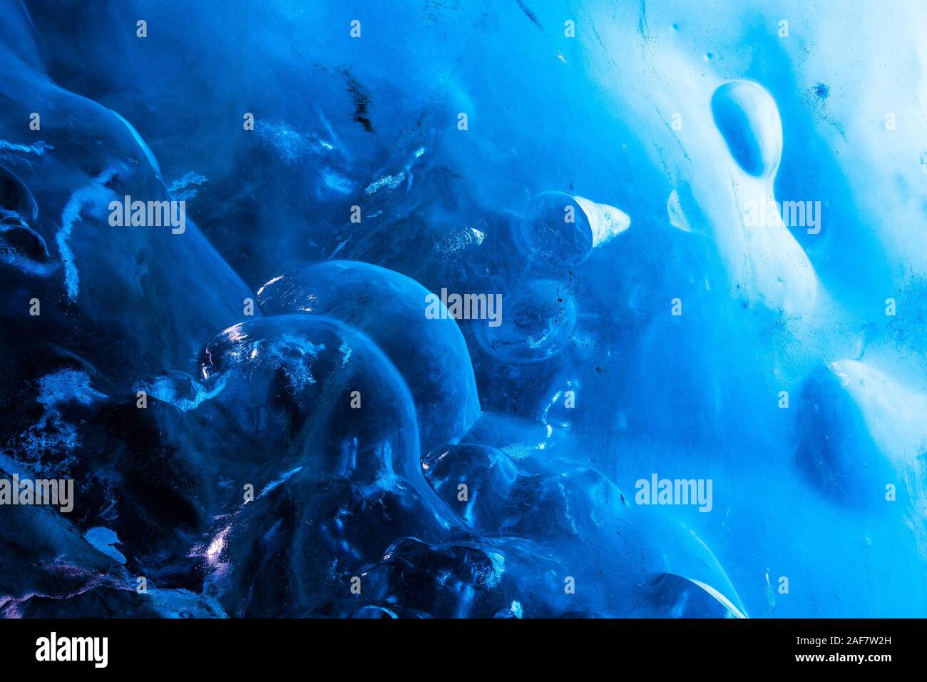Under the Glacier: Close-up shot of the surface in an ice cave, Iceland Stock Photo