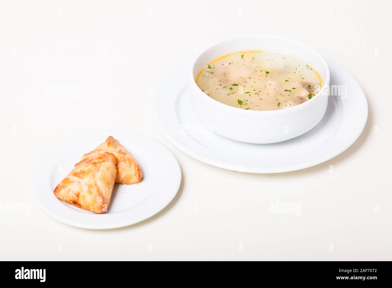 Russian clear fish soup with open-topped pastry called rasstegai Stock ...