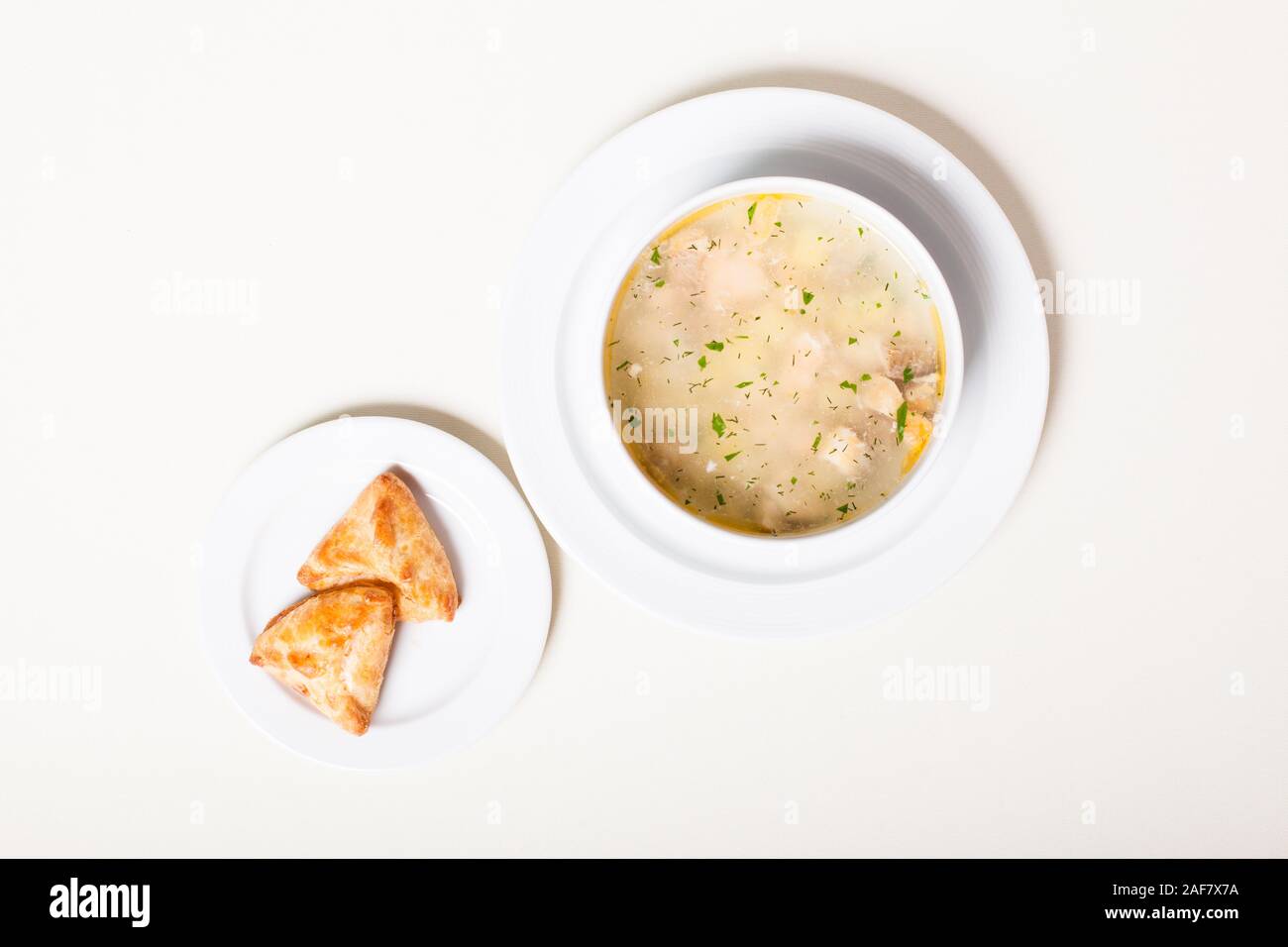 Russian clear fish soup with open-topped pastry called rasstegai Stock ...