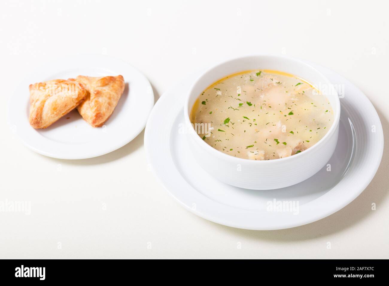 Russian clear fish soup with open-topped pastry called rasstegai Stock ...