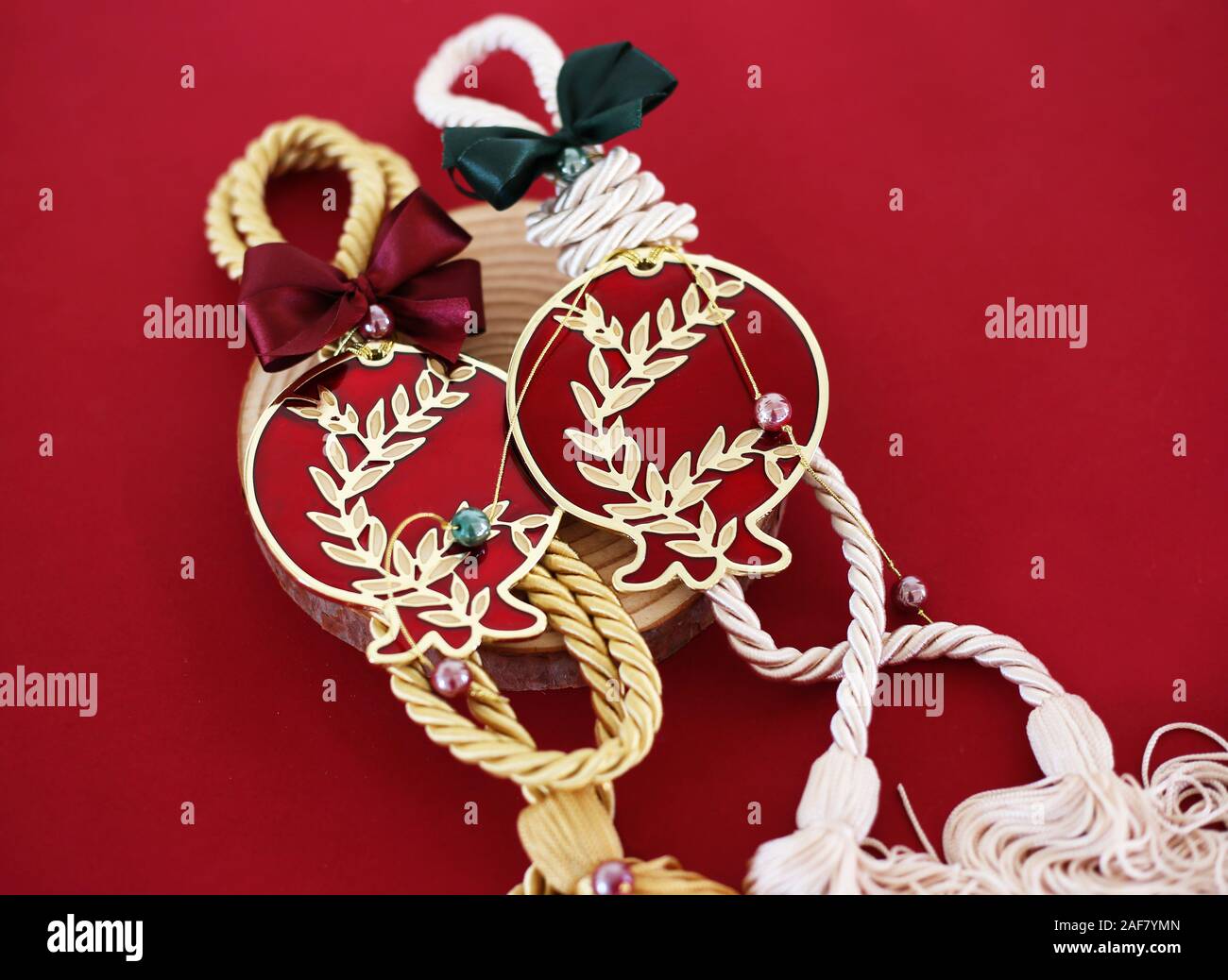 decorative christmas lucky charms with red metallic pomegranates Stock Photo