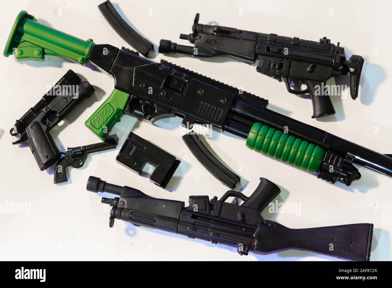Small plastic best sale toy guns