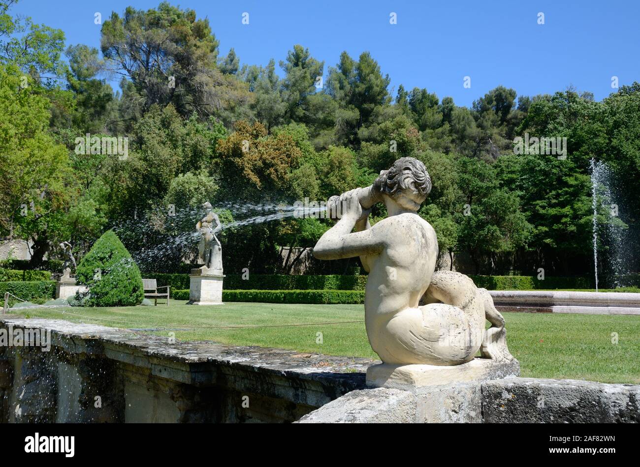 Triton Fountain, Merman Sculpture, Water Spout & Fountain Jardins d'Albertas Garden or Gardens Bouc-bel-Air near Aix-en-Provence Provence France Stock Photo